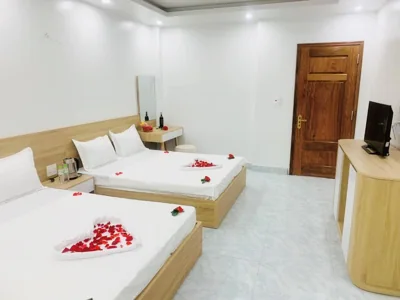 Deluxe-Vierbettzimmer — Hùng Thảo HOMESTAY